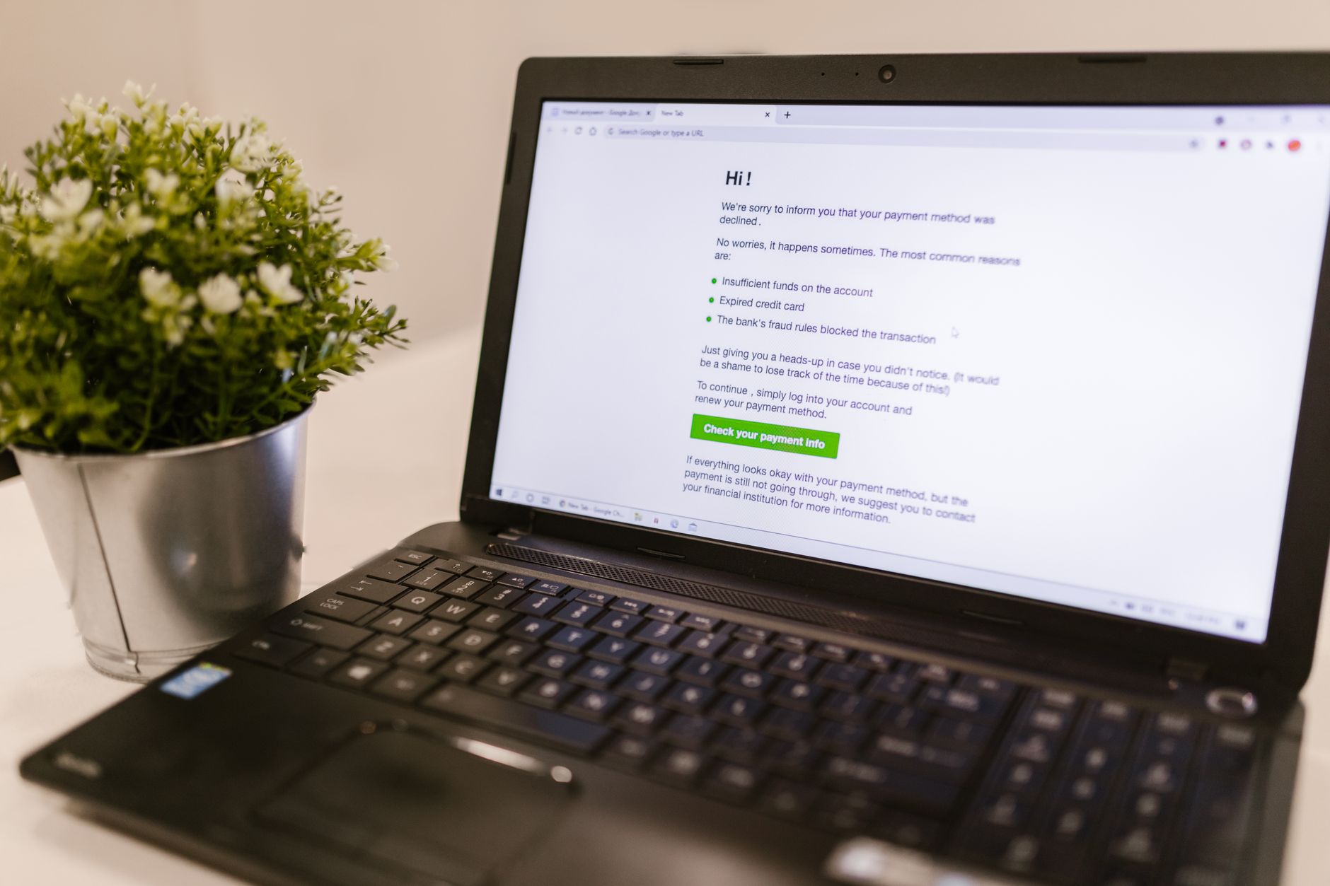 Laptop screen showing a payment method declined error message from an online platform