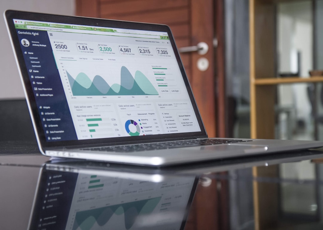 SEO vs Google Ads for Nigerian Startups With ₦500k Analytics dashboard on a laptop showing compounding traffic growth charts — representing long-term SEO results over time